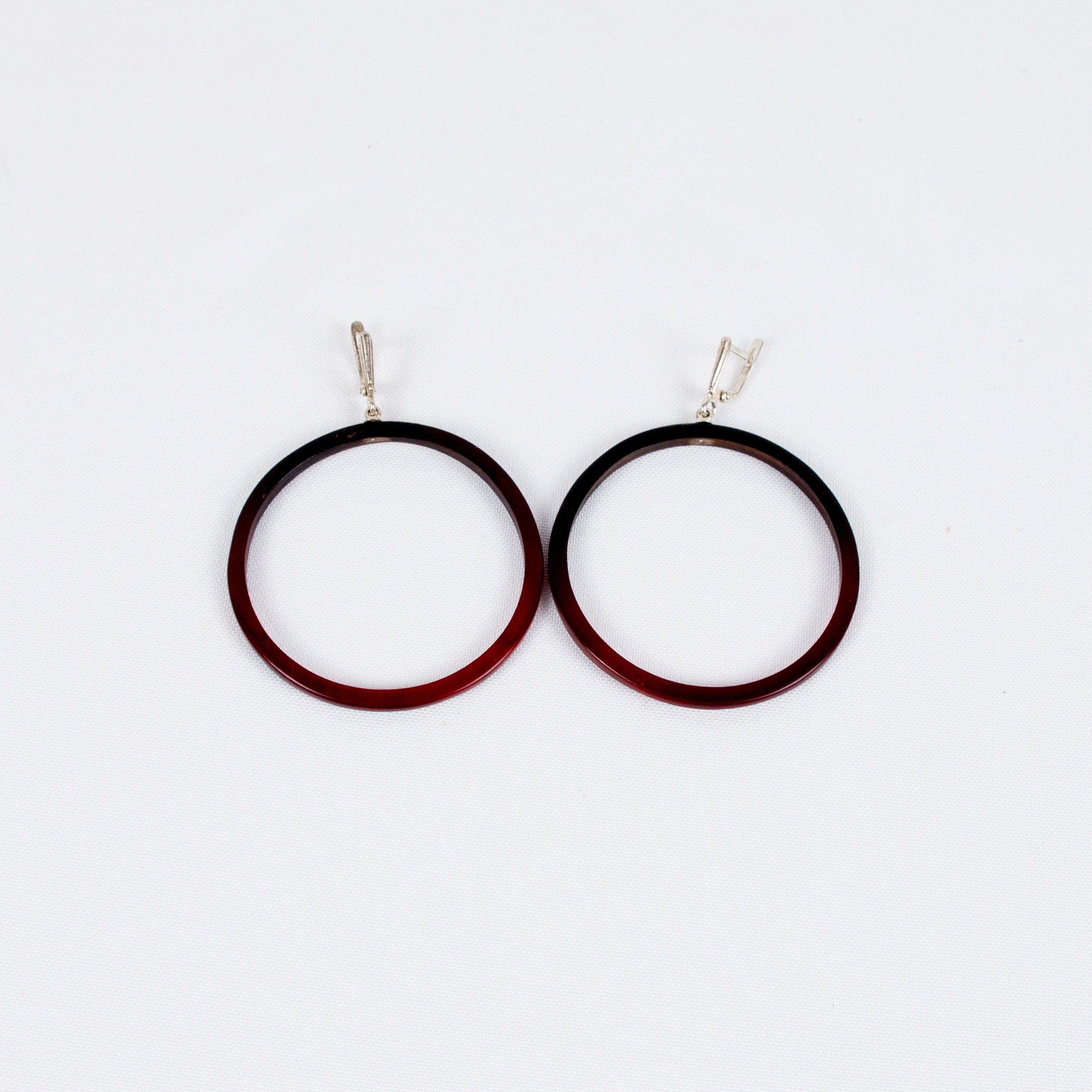 Red hoop earrings