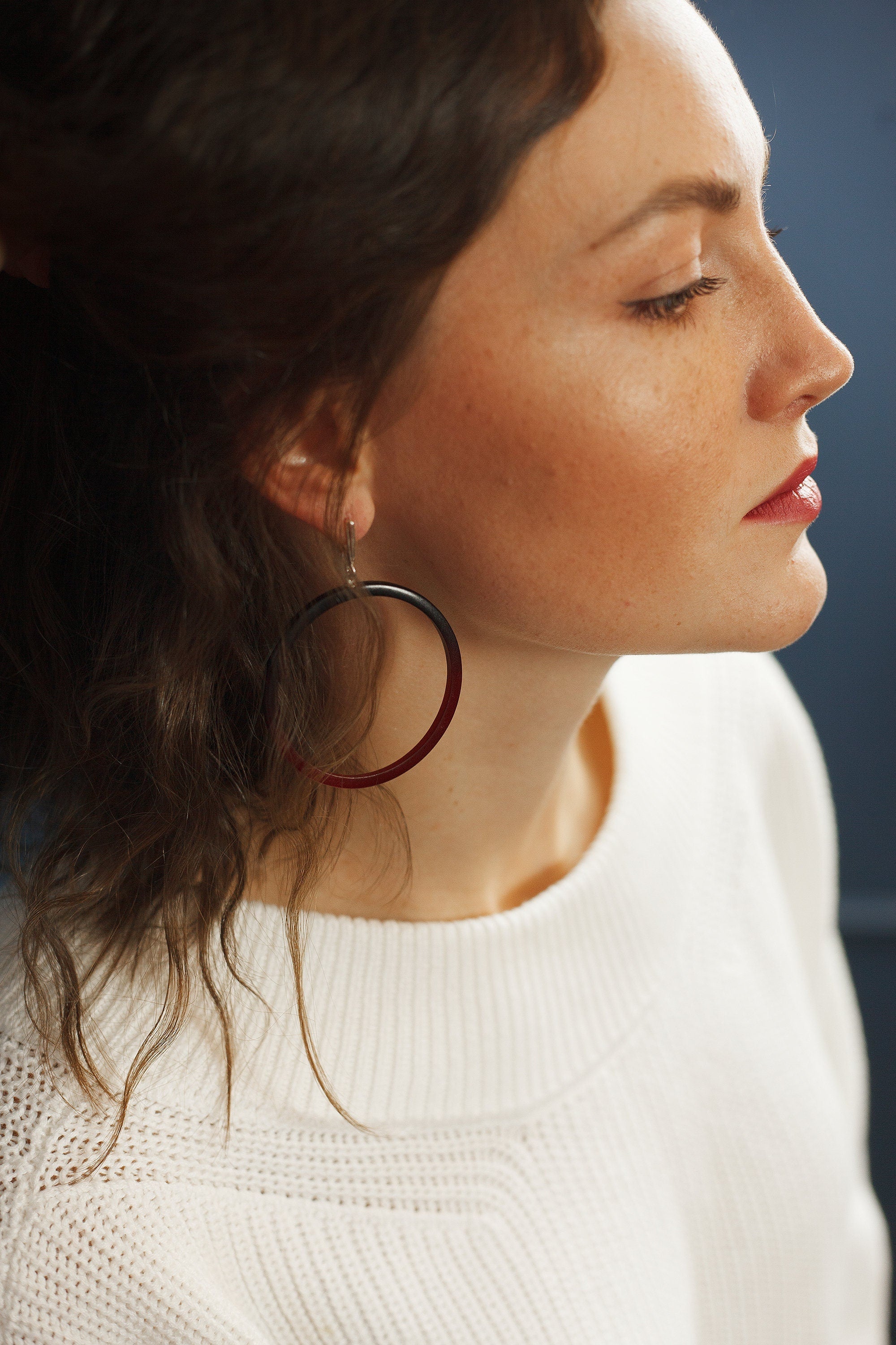 Red hoop earrings