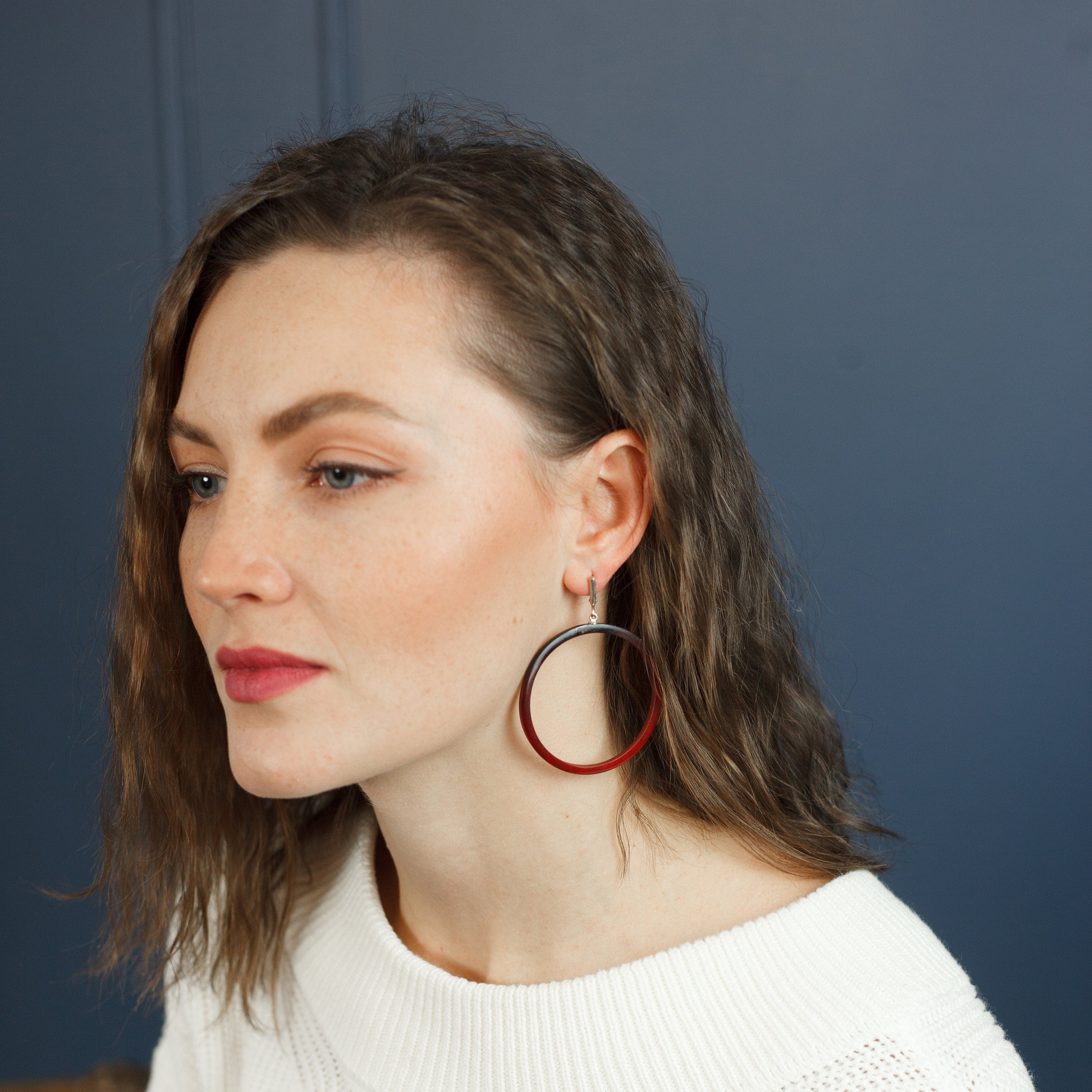 Red hoop earrings